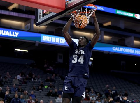 Photo: California Interscholastic Federation (CIF). SGA sophomore Mahamadou
Diop scores a dunk in the winning game to take the CIF Division III state champions title.