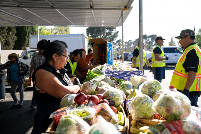 The space has evolved over the years to support
the ministry—collapsible canopies borrowed from
Pathfinders have been replaced with a built-in awning on the storage building that serves to cover the preparation and service area.