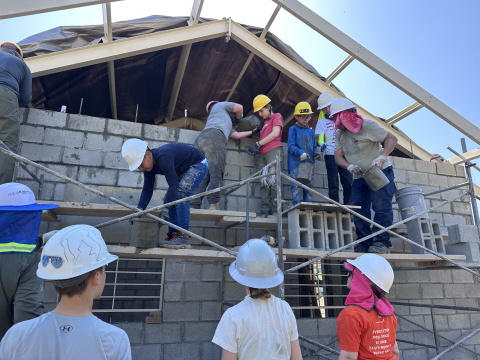 CAES students overcame physically demanding tasks on the jobsite and reached their construction goal in just four days.