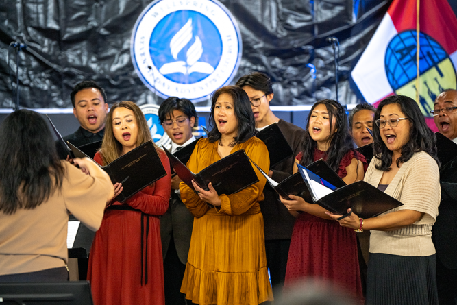 Members of the Glendale Filipino church choir sing at the Wellspring company organization. Glendale Filipino church was the mother church to the Wellspring congregation when it was a group.