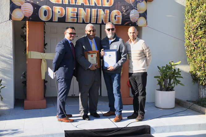 From left to right: Robert Turcios, Whittier head deacon and men’s ministry president; Lee, SCC executive vice president, Martinez, Whittier councilmember; and Richard Hernandez, Whittier ACS director. Lee holds a commemoration of service plaque for three Whittier church members, and Martinez holds a certificate of commendation for the Whittier ACS food pantry.